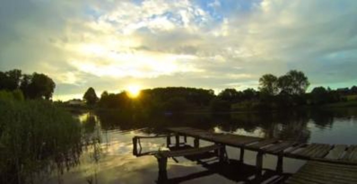 See mit Sonnenuntergang